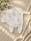 Personalised I Love My Big Brother baby bodysuit and sleepsuit set in white with gold teddy bear print and name Ronnie