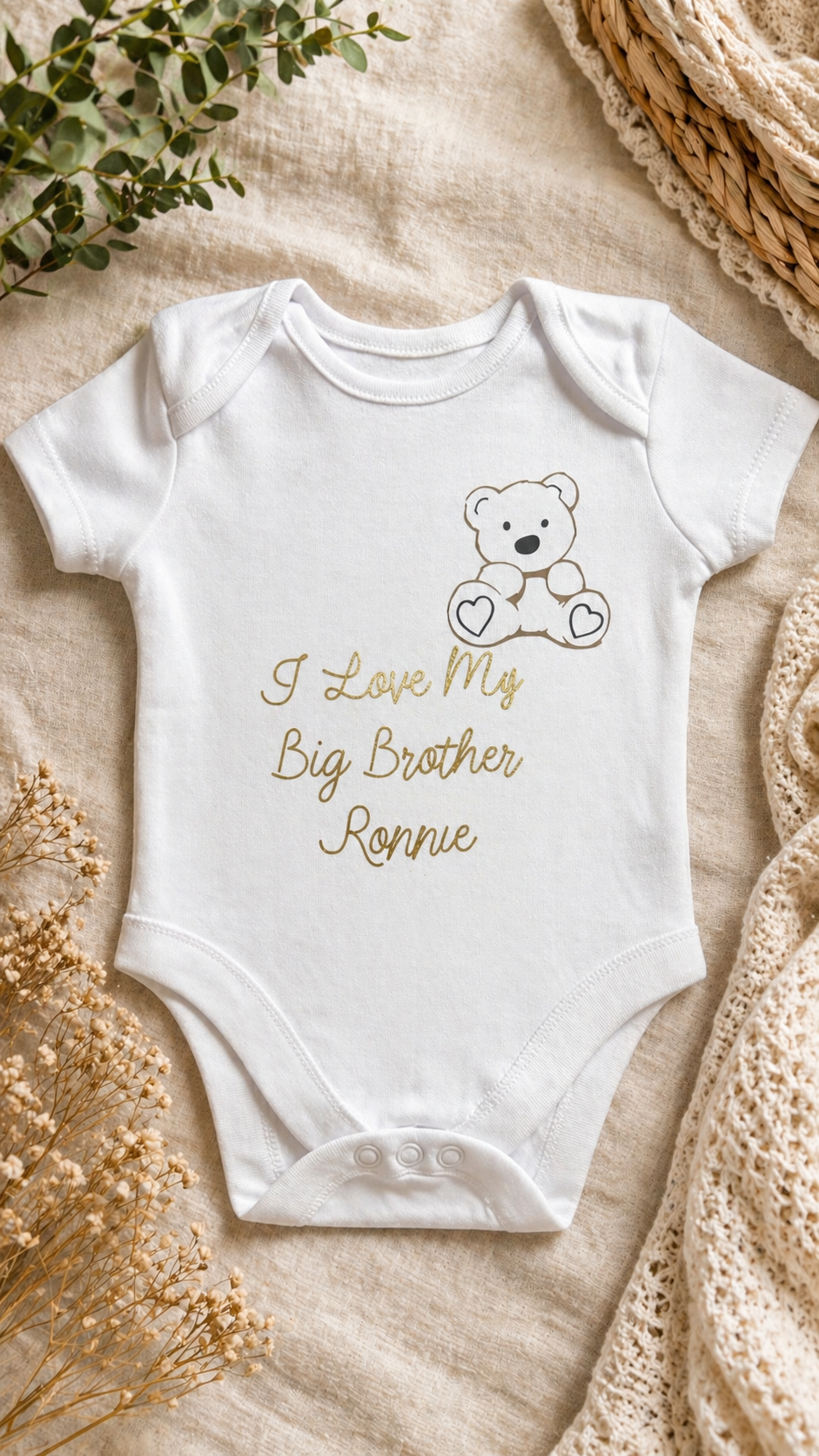 Personalised I Love My Big Brother white baby bodysuit with gold teddy bear illustration and name Ronnie on cream background