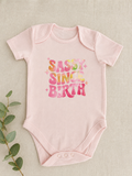 Sassy Since Birth blush pink baby bodysuit with tie-dye slogan print